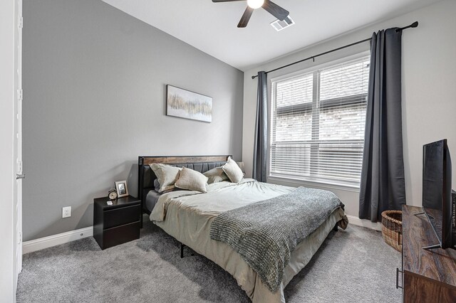 2104 Terra Rose Dr, Katy, TX 77493 - bedroom with carpet floors, baseboards, and ceiling fan