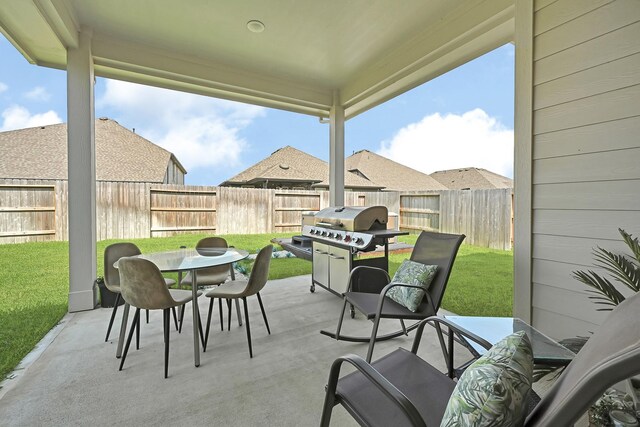 2104 Terra Rose Dr, Katy, TX 77493 - view of patio / terrace with outdoor dining space and grilling area