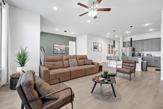 2104 Terra Rose Dr, Katy, TX 77493 - living area with recessed lighting, ceiling fan, and wood finish floors