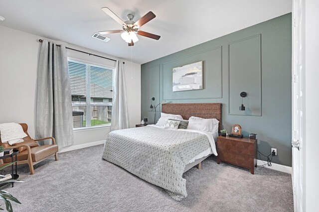 2104 Terra Rose Dr, Katy, TX 77493 - carpeted bedroom with baseboards and ceiling fan