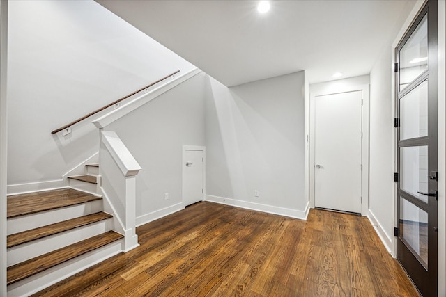 1518 Houston Ave, Houston, TX 77007 - stairs featuring wood finished floors, baseboards, and recessed lighting
