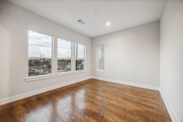 1518 Houston Ave, Houston, TX 77007 - spare room with baseboards, wood finished floors, and recessed lighting
