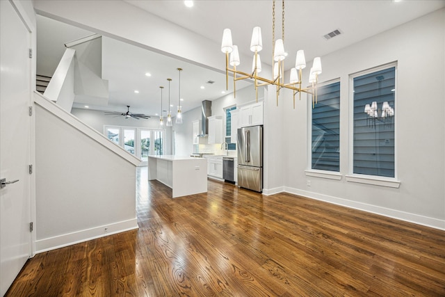 1518 Houston Ave, Houston, TX 77007 - unfurnished living room featuring a chandelier, stairs, recessed lighting, dark wood-style flooring, and baseboards