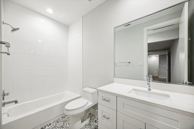 1518 Houston Ave, Houston, TX 77007 - bathroom with toilet, vanity, tile patterned floors, washtub / shower combination, and recessed lighting