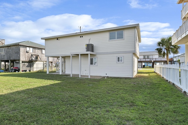 13014 John Reynolds Rd, Galveston, TX 77554 - rear view of house with a patio