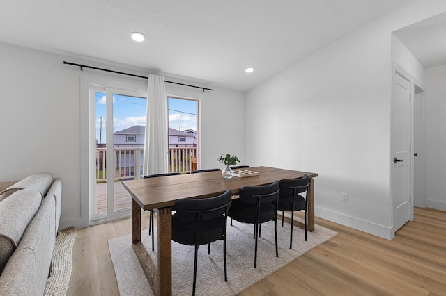 13014 John Reynolds Rd, Galveston, TX 77554 - dining space featuring light wood finished floors, recessed lighting, and baseboards