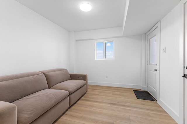 13014 John Reynolds Rd, Galveston, TX 77554 - living area featuring light wood-style floors and baseboards