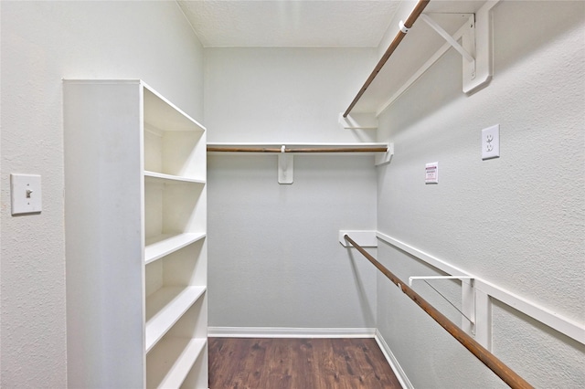 20610 Arrow Falls Ln, Richmond, TX 77407 - walk in closet with wood finished floors