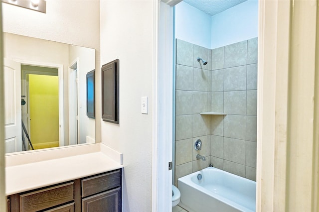 20610 Arrow Falls Ln, Richmond, TX 77407 - bathroom featuring vanity, shower / bathtub combination, and toilet