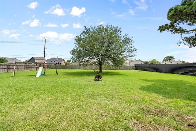 1814 Caroline Ave, Baytown, TX 77523 - view of yard featuring a playground