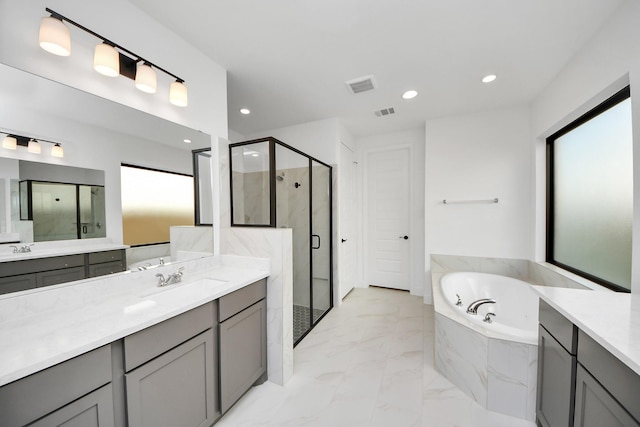 10414 Cloud Shimmer Trce, Richmond, TX 77406 - full bathroom featuring a stall shower, marble finish floors, a garden tub, two vanities, and recessed lighting