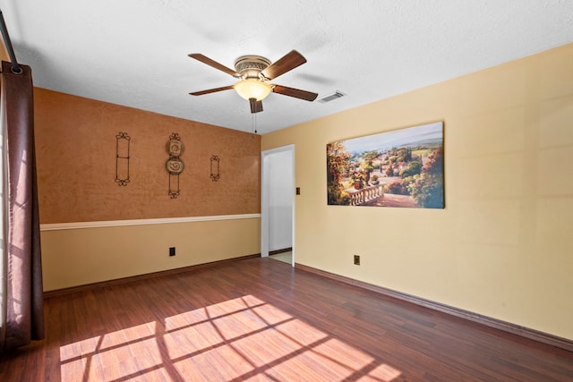 10507 Stockman Ln, Sugar Land, TX 77498 - unfurnished room with wood finished floors, ceiling fan, and baseboards
