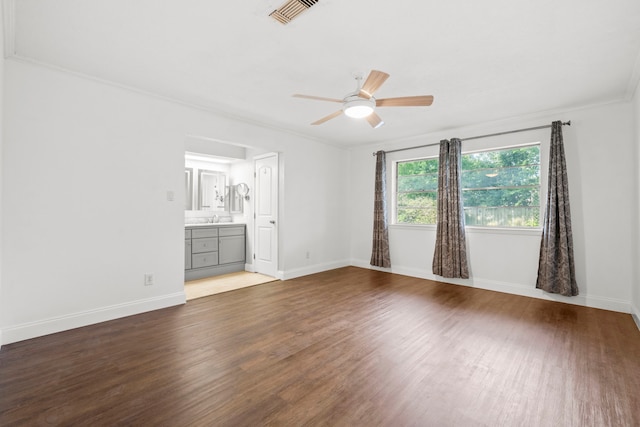 10507 Stockman Ln, Sugar Land, TX 77498 - unfurnished room featuring wood finished floors, a ceiling fan, and baseboards
