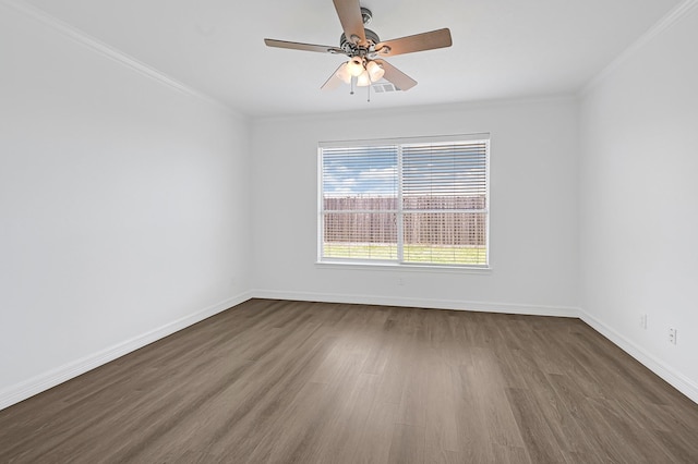 21357 Thurston Crossing Dr, Porter, TX 77365 - unfurnished room with dark wood-style flooring, crown molding, baseboards, and a ceiling fan