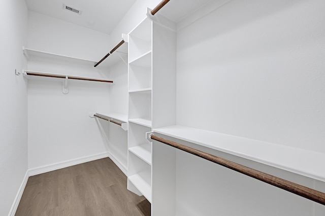 21357 Thurston Crossing Dr, Porter, TX 77365 - spacious closet with wood finished floors