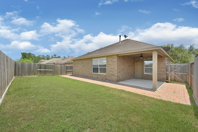 21357 Thurston Crossing Dr, Porter, TX 77365 - rear view of property with brick siding, ceiling fan, and a patio area