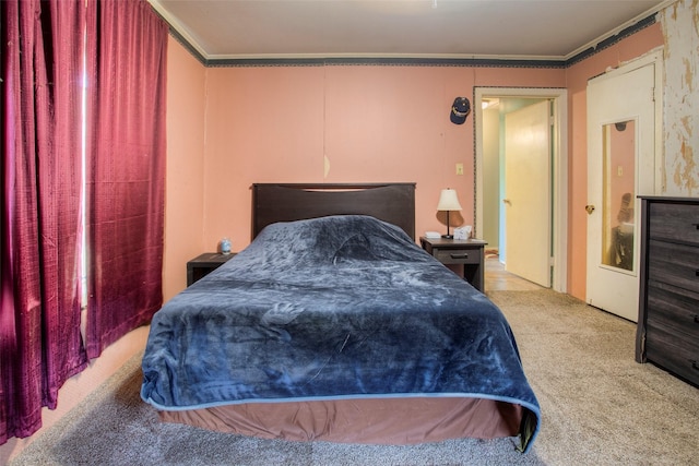 712 E Morris St, Madisonville, TX 77864 - bedroom featuring carpet floors and crown molding