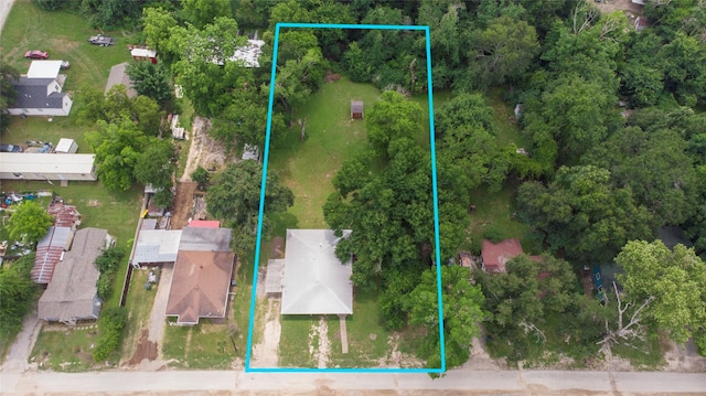 712 E Morris St, Madisonville, TX 77864 - aerial overview of property's location with property boundaries highlighted