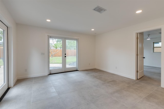 1730 Wakefield Dr, Houston, TX 77018 - unfurnished room with french doors, plenty of natural light, recessed lighting, and baseboards