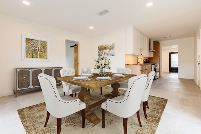 1730 Wakefield Dr, Houston, TX 77018 - dining area with light tile patterned floors, recessed lighting, and baseboards