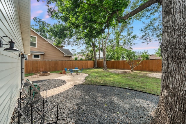 1730 Wakefield Dr, Houston, TX 77018 - view of yard featuring an outdoor fire pit and a patio