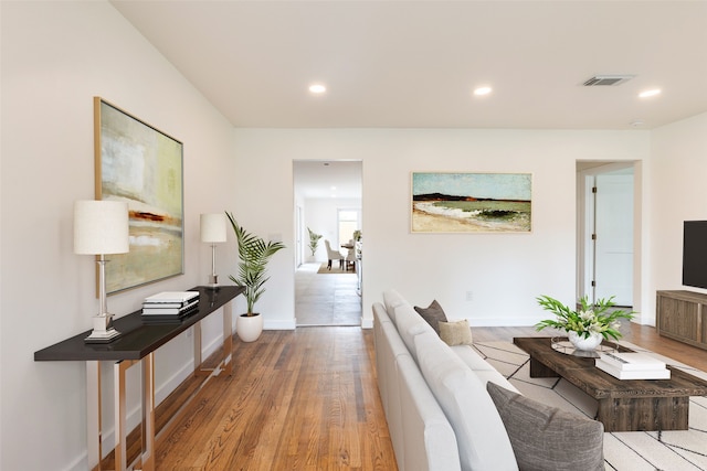 1730 Wakefield Dr, Houston, TX 77018 - living room with wood finished floors, recessed lighting, and baseboards