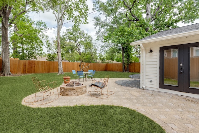 1730 Wakefield Dr, Houston, TX 77018 - view of patio / terrace with a fire pit and french doors