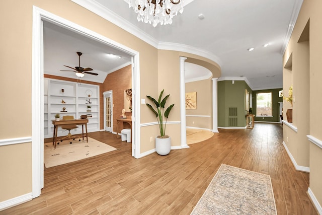 1542 Orchard Park Dr, Houston, TX 77077 - foyer with ornamental molding, baseboards, light wood finished floors, and ceiling fan