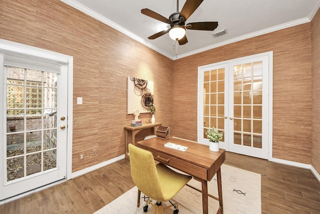 1542 Orchard Park Dr, Houston, TX 77077 - office with french doors, baseboards, wood finished floors, ceiling fan, and ornamental molding