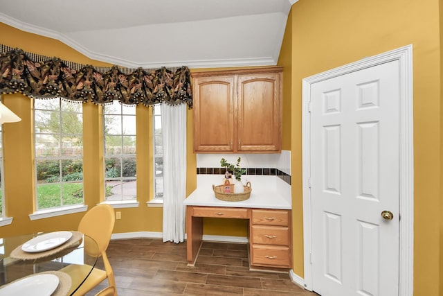 1542 Orchard Park Dr, Houston, TX 77077 - dining room with healthy amount of natural light, dark wood finished floors, baseboards, and crown molding