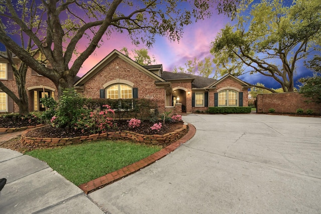 1542 Orchard Park Dr, Houston, TX 77077 - view of front of house with brick siding and driveway