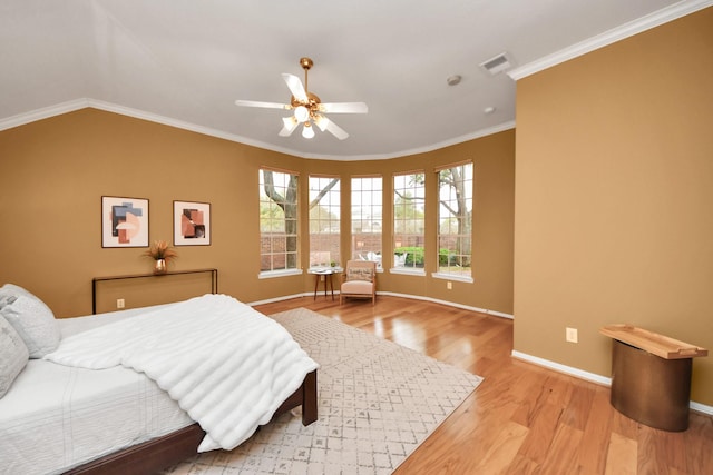 1542 Orchard Park Dr, Houston, TX 77077 - bedroom with wood finished floors, baseboards, ornamental molding, and ceiling fan