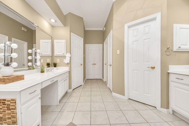 1542 Orchard Park Dr, Houston, TX 77077 - bathroom featuring vanity, tile patterned flooring, and baseboards