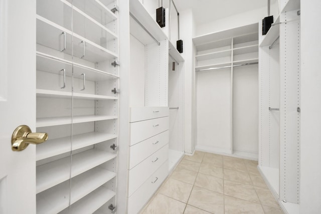 1542 Orchard Park Dr, Houston, TX 77077 - spacious closet with light tile patterned floors