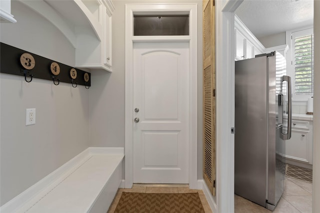 9611 Stonebridge Pl, Tomball, TX 77375 - mudroom with light tile patterned floors