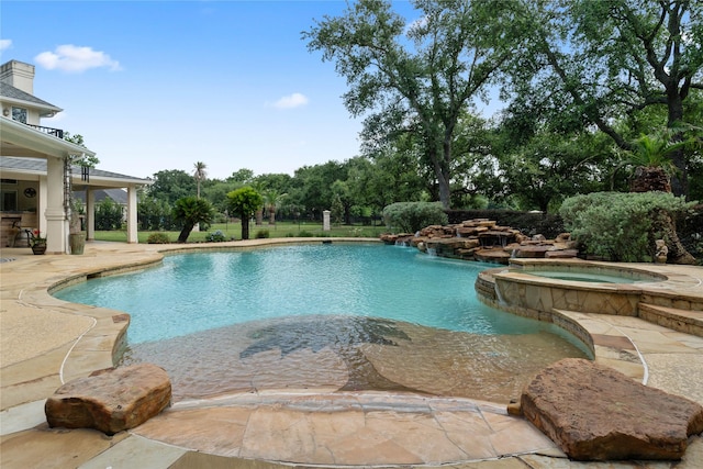 9611 Stonebridge Pl, Tomball, TX 77375 - view of pool with a patio and a pool with connected hot tub