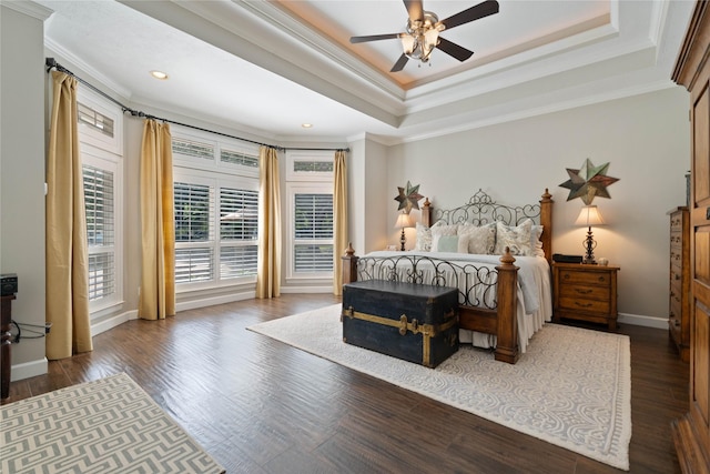 9611 Stonebridge Pl, Tomball, TX 77375 - bedroom featuring crown molding, wood finished floors, a raised ceiling, baseboards, and a ceiling fan