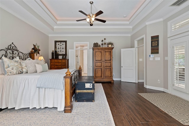 9611 Stonebridge Pl, Tomball, TX 77375 - bedroom featuring a raised ceiling, dark wood finished floors, access to outside, ornamental molding, and baseboards