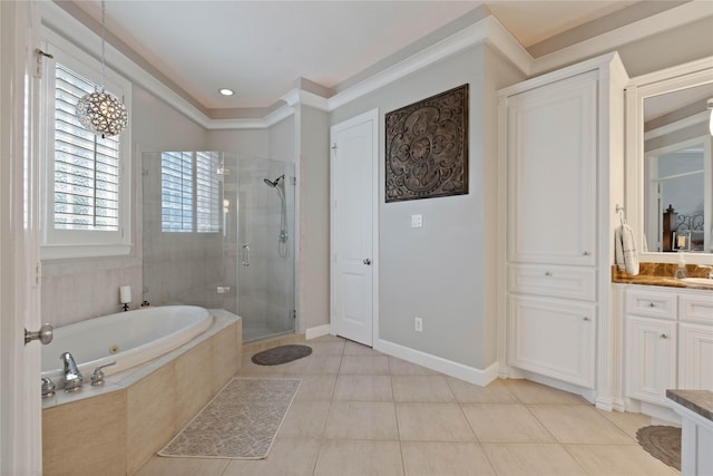 9611 Stonebridge Pl, Tomball, TX 77375 - bathroom featuring vanity, a stall shower, a jetted tub, ornamental molding, and tile patterned floors