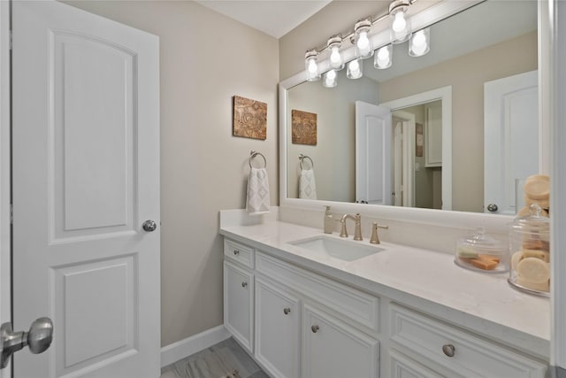 9611 Stonebridge Pl, Tomball, TX 77375 - bathroom with vanity and baseboards