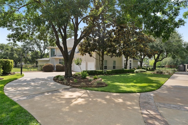 9611 Stonebridge Pl, Tomball, TX 77375 - view of front of house with concrete driveway and stucco siding