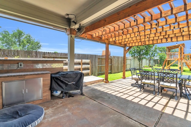 3506 Bennett Trails Dr, Spring, TX 77386 - view of patio with outdoor dining area, a grill, a pergola, and a playground