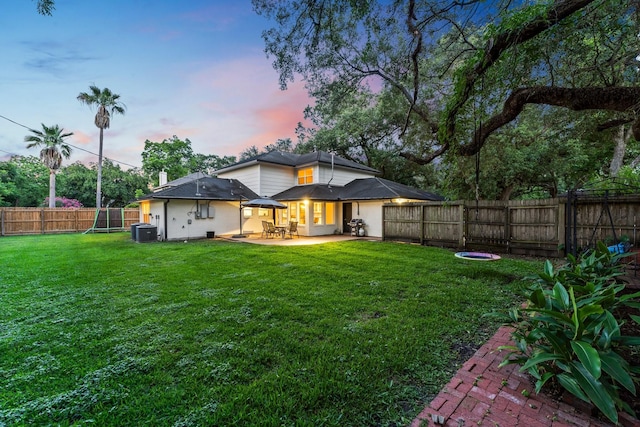 9382 Livernois Rd, Houston, TX 77080 - back of property with central AC unit, a patio, and a chimney