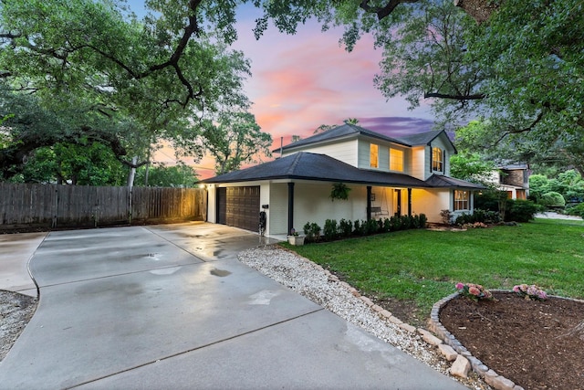 9382 Livernois Rd, Houston, TX 77080 - view of front of house with driveway, an attached garage, brick siding, and covered porch
