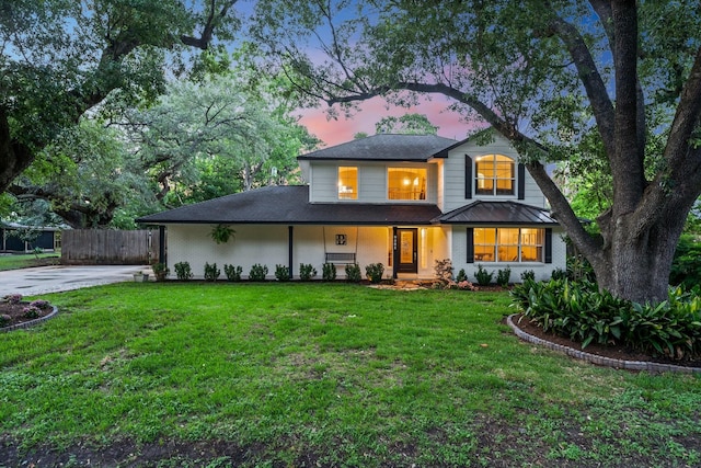 9382 Livernois Rd, Houston, TX 77080 - view of front of house with a standing seam roof and driveway