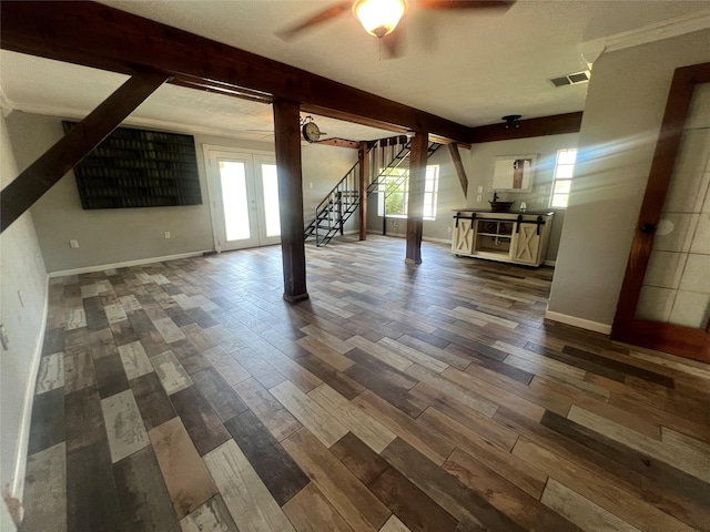 10011 Schanzer Rd, Hitchcock, TX 77563 - unfurnished living room featuring stairs, ceiling fan, dark wood-style flooring, baseboards, and beamed ceiling