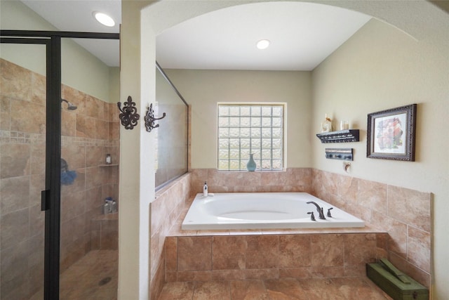 5112 E Settlers Bnd, Montgomery, TX 77316 - full bathroom featuring a bath and a stall shower