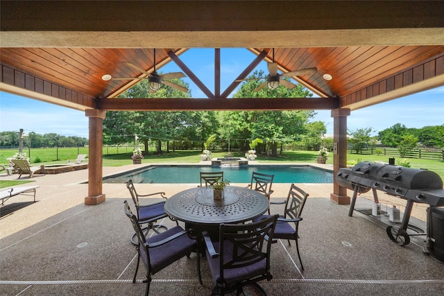 5112 E Settlers Bnd, Montgomery, TX 77316 - view of patio / terrace with a gazebo, ceiling fan, a pool with connected hot tub, and a grill