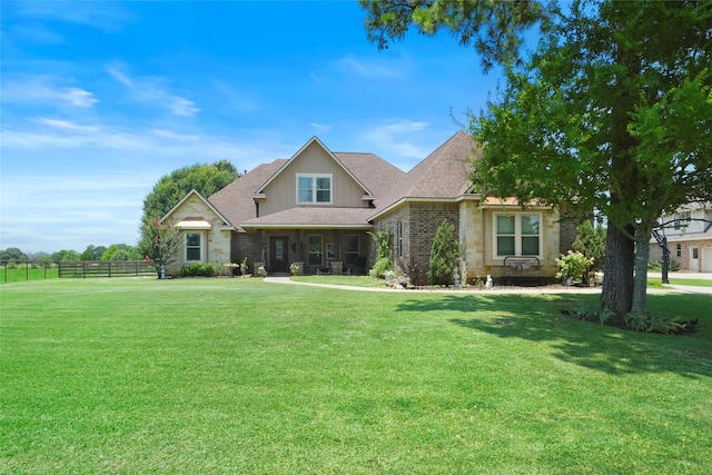 5112 E Settlers Bnd, Montgomery, TX 77316 - view of front of property with roof with shingles and board and batten siding
