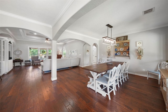 5112 E Settlers Bnd, Montgomery, TX 77316 - dining area with arched walkways, hardwood / wood-style floors, crown molding, baseboards, and ceiling fan